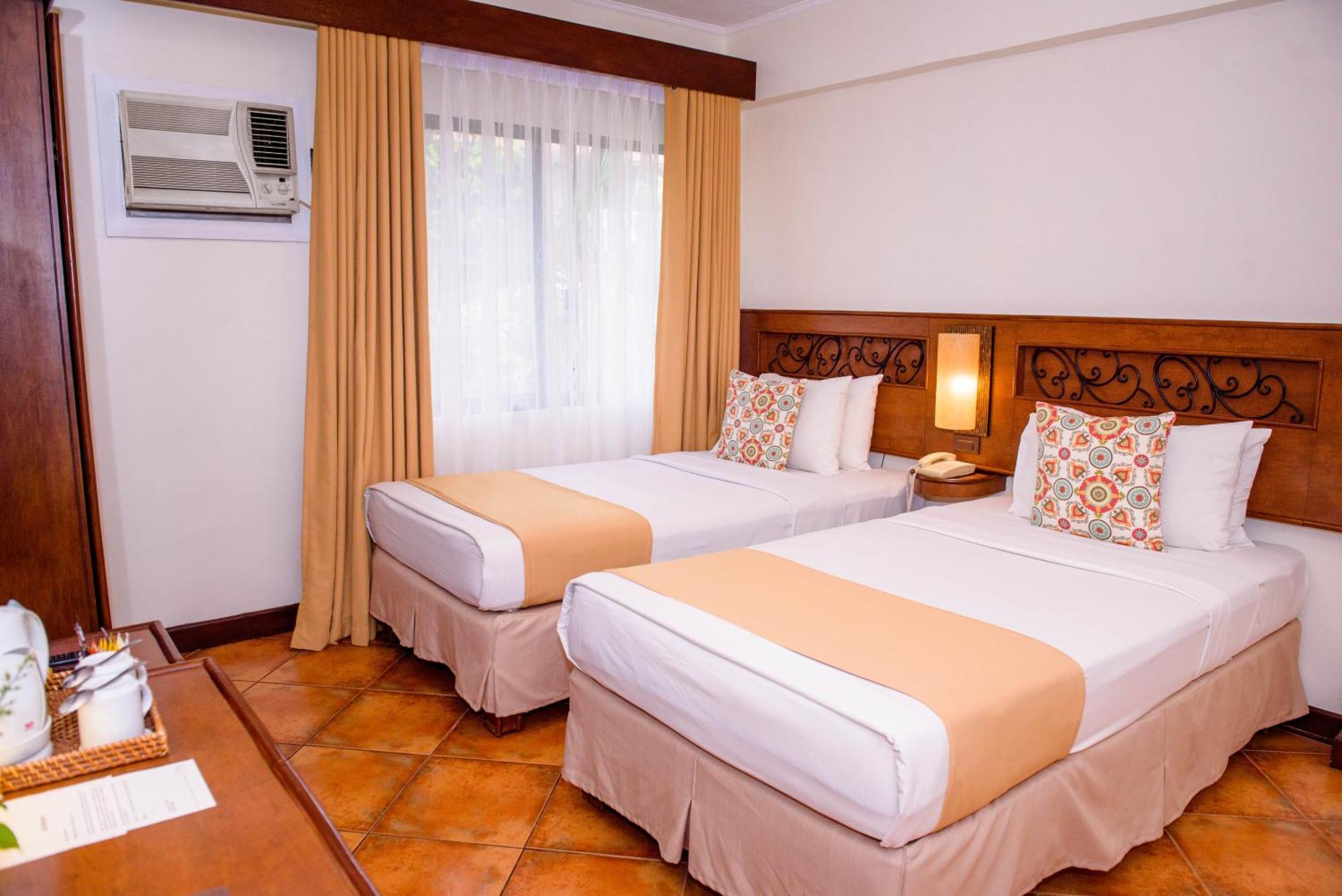 Montebello Villa Hotel Себу Номер фото